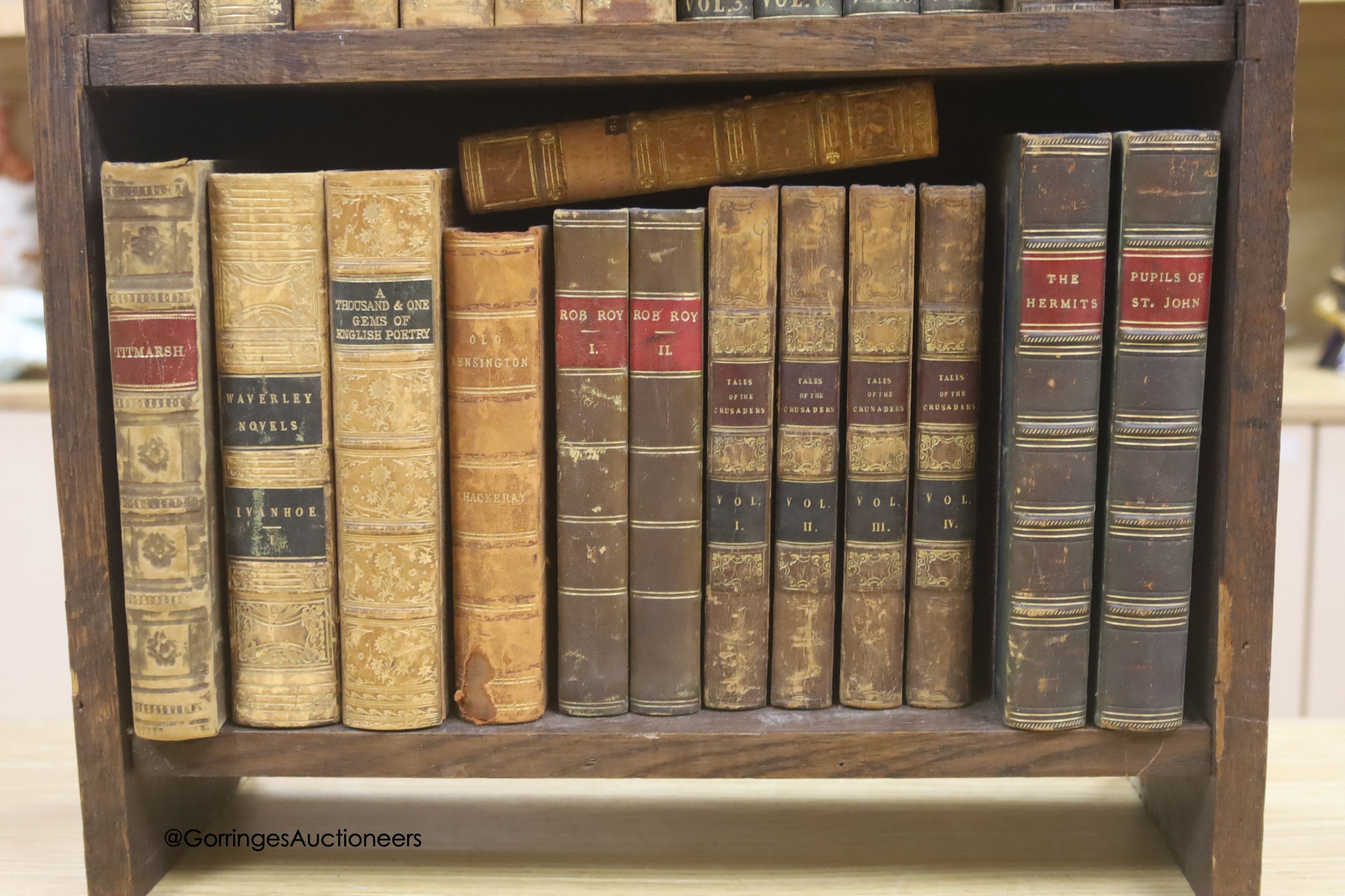 A group of 19th century leather bindings including Waverley Novels, Rob Roy, Tales of The Crusaders, etc., displayed in an oak bookcase, height 66cm